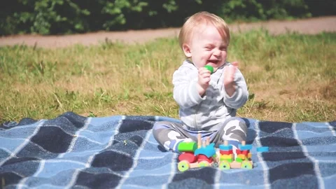Child playing outdoors Stock Footage 133178779