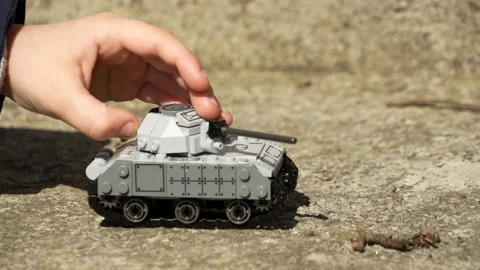 A child playing outside with a tank Stock Footage 185400422