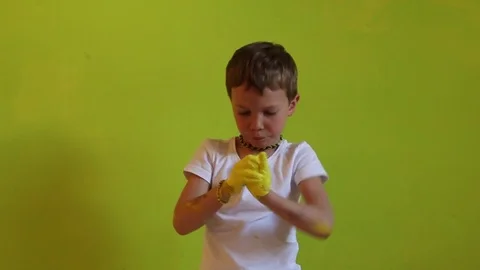 Child playing with paint Stock Footage 83343380