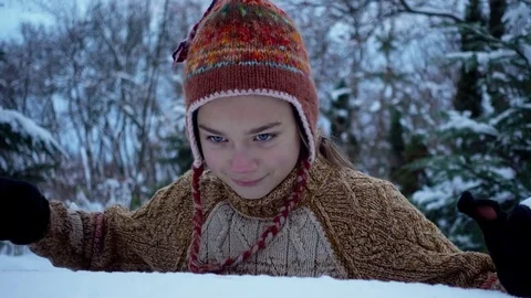 A child playing in the park in the snow. Stock Footage 83386468
