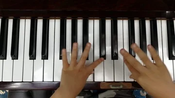 Child playing piano. Side view of a child playing piano. Close up on piano keys Stock Footage 86141612