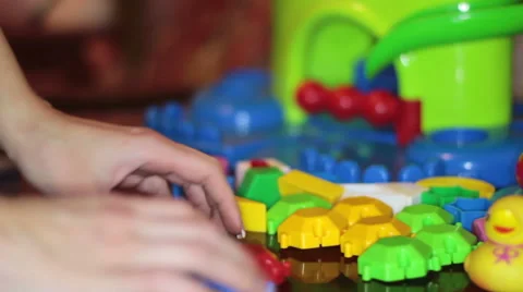 Child Playing In The Plastic Constructor 1 Video stock 45415520