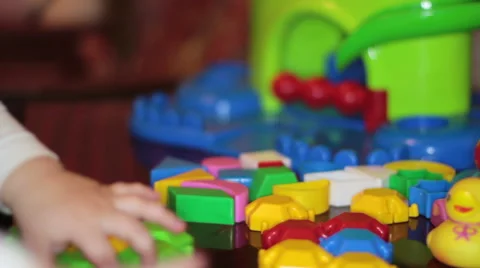 Child Playing In The Plastic Constructor 2 Stock Footage 45415484