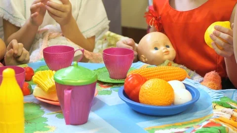 Child playing with plastic tableware Stock Footage 78113653