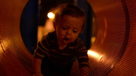 The child is playing in the playground, 動画素材 97821901