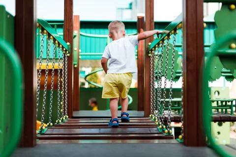 Child playing on the playground Stock-Fotos