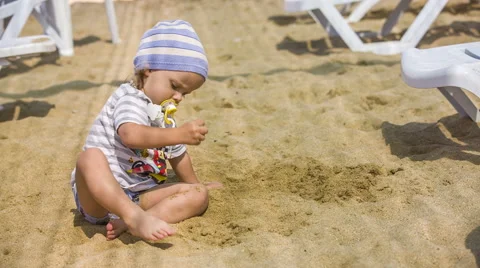 Child Playing In Sand Stock Footage 41496217