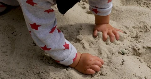 Child playing in sandbox Stock Footage 112602409
