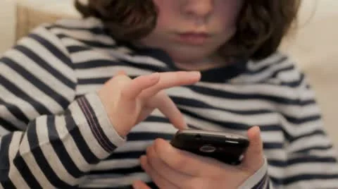 Child playing with smartphone Stock Footage 20472974