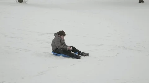 A child playing in the in the snow. Stock Footage 87308388