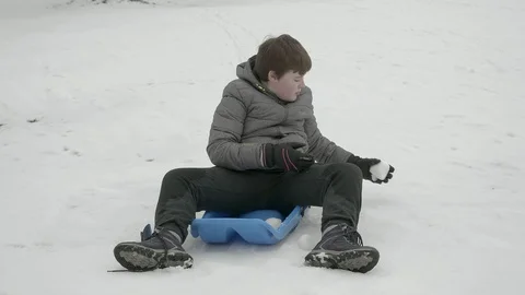 A child playing in the in the snow. Stock Footage 87308631