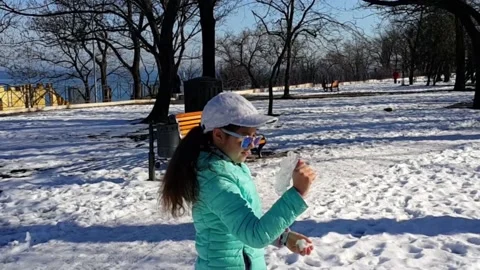 Child playing with snow. Stock Footage 146270575