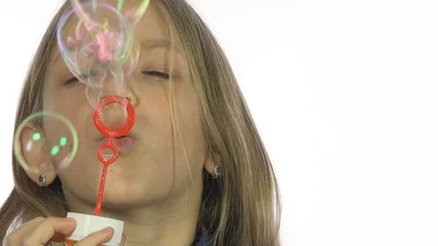 Child Playing Soap Bubbles, Happy Smiling Girl Blowing Balloons, Slow Motion Stock Footage 84886687
