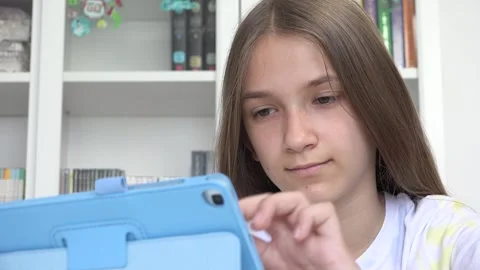 Child Playing Tablet Browsing Internet, Kid Using Smartphone, Girl Writing Stock Footage 336065087