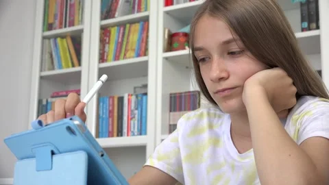 Child Playing Tablet Browsing Internet, Kid Using Smartphone, Girl Writing Stock Footage 340182971