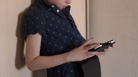 A child is playing a tablet Stock Footage 74969555