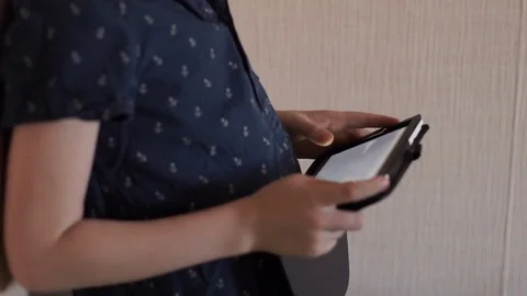 A child is playing a tablet Stock Footage 74972055