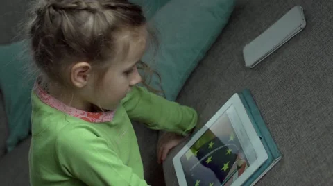 Child playing on a tablet pc Stock Footage 49801862