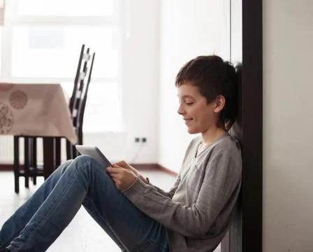 Child playing at tablet Stock Photos