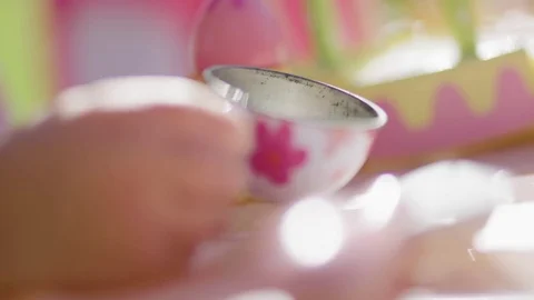 Child Playing with Tea Cup Video stock 76726443