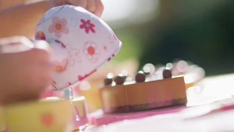 Child Playing with Tea Pot Video stock 76725257