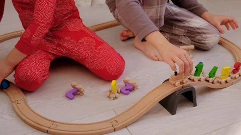 Child playing with a train. Selective focus. Stock Footage 304539482