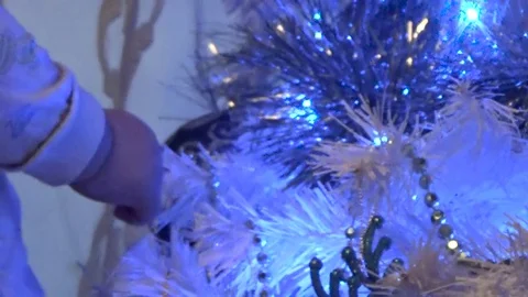 The child playing with the tree Video stock 82609204