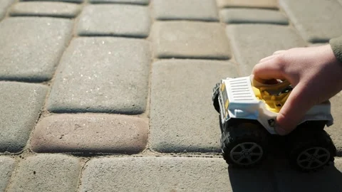 The child is playing with a typewriter 스톡 동영상 135584083