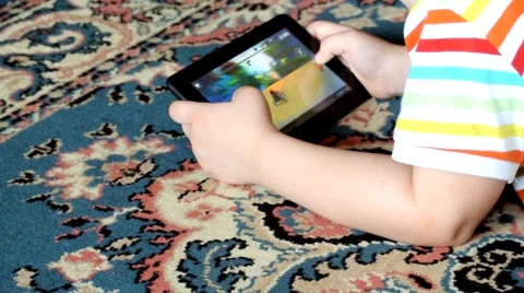 Child playing a video game Stock Footage 36238968