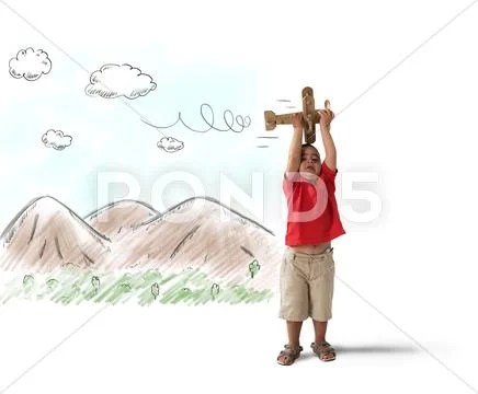 Child playing with wooden plane Stock Photos
