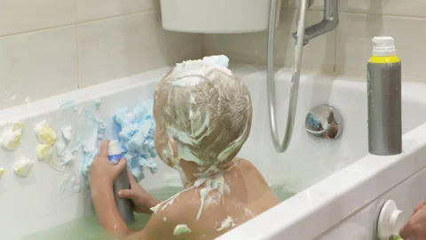 Child Plays In The Bath Stock Footage 299781093