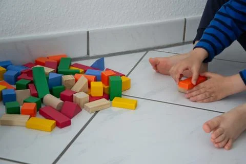 A child plays with blocks Stock Photos