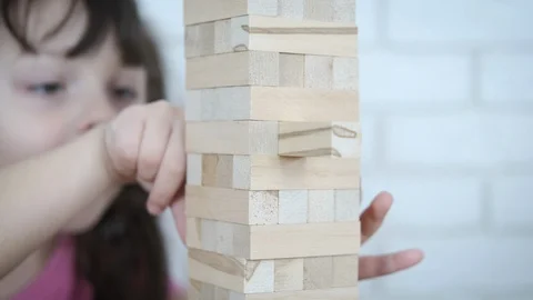 A child plays a board game. Stock-Footage 103550886