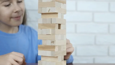 A child plays board games. Stock Footage 103549488