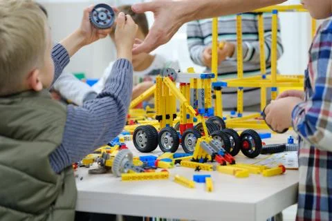 Child plays with a builder kit Stock Photos
