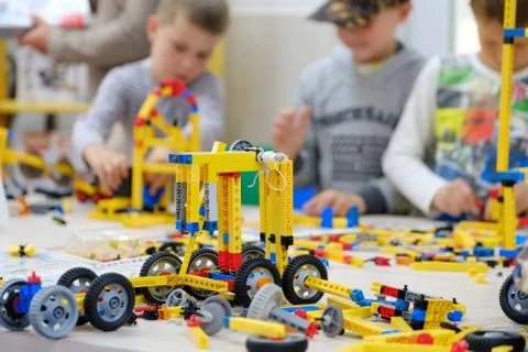 Child plays with a builder kit Stock Photos