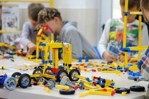 Child plays with a builder kit Stock Photos