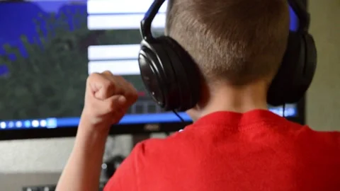 The child plays on the computer. Stock Footage 132754139