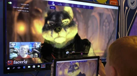 A child plays computer game with monster and Intel's RealSense technology  Stockbeeldmateriaal 63539952