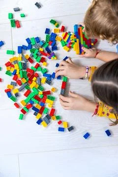 The child plays as a constructor. Selective focus. Stock Photos