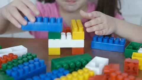 The child plays with the designer. Stock Footage 103550254