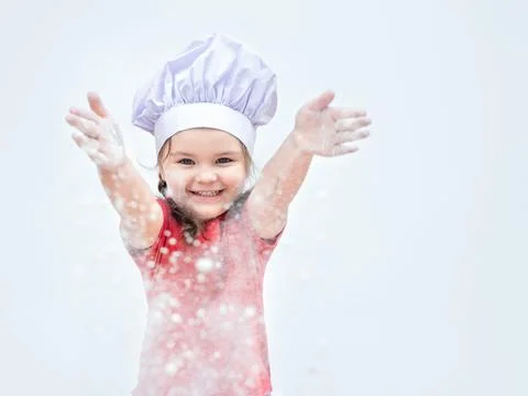 A child plays with flour Stock Photos
