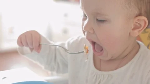 Child plays with food Stock-Footage 73299343