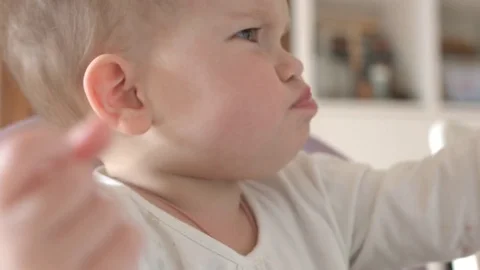 Child plays with food 스톡 동영상 73299610
