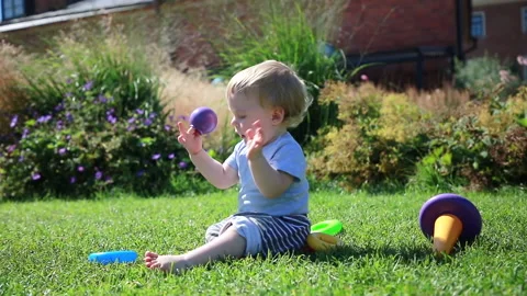 The child plays Stock Footage 136977539