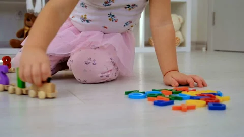 The child plays learns numbers and letters. Selective focus. Stock Footage 233371960