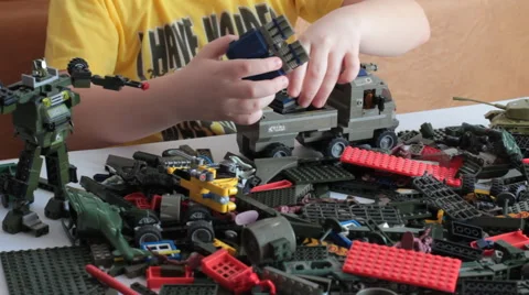 The Child Plays With LEGO 動画素材 48063885