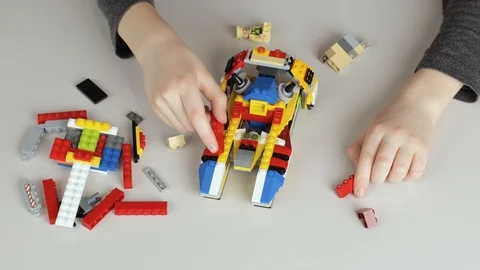 Child plays lego Stock Footage 127442691