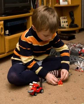 The child plays. Stock Photos
