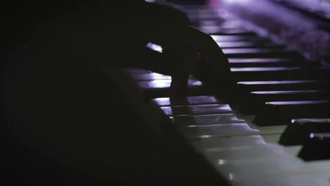 A child plays the piano Видео 99326422
